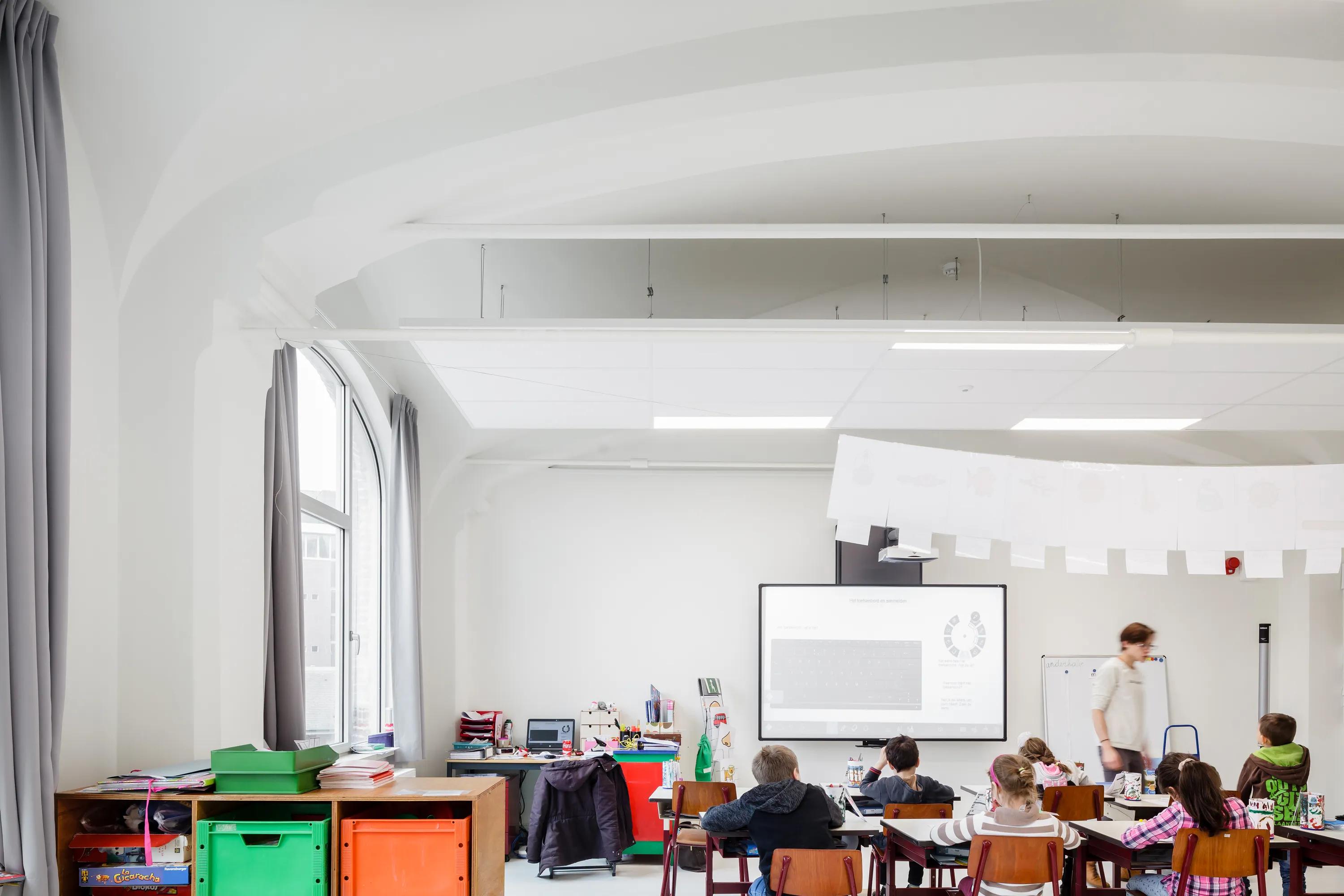 white suspended ceiling design in a classroom
