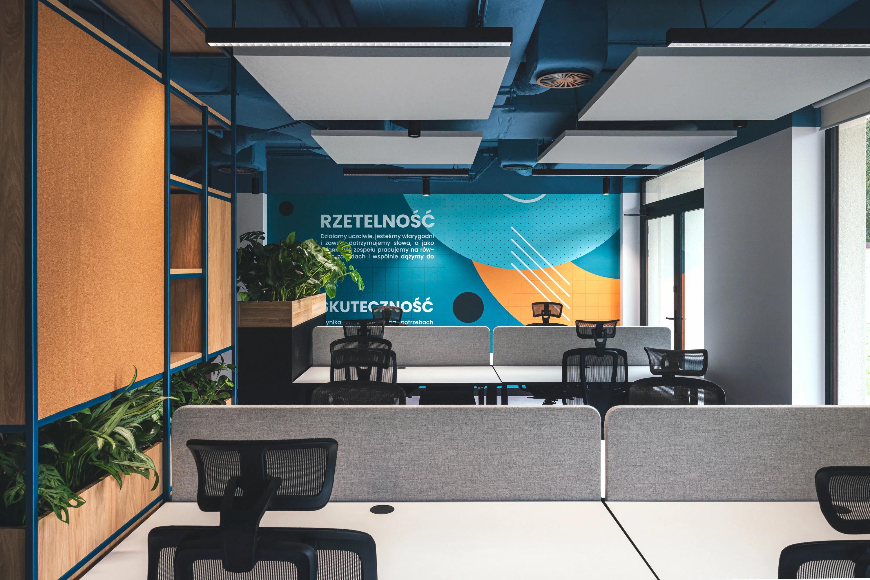 Gray floating ceiling panels in an open ceiling design in an open office