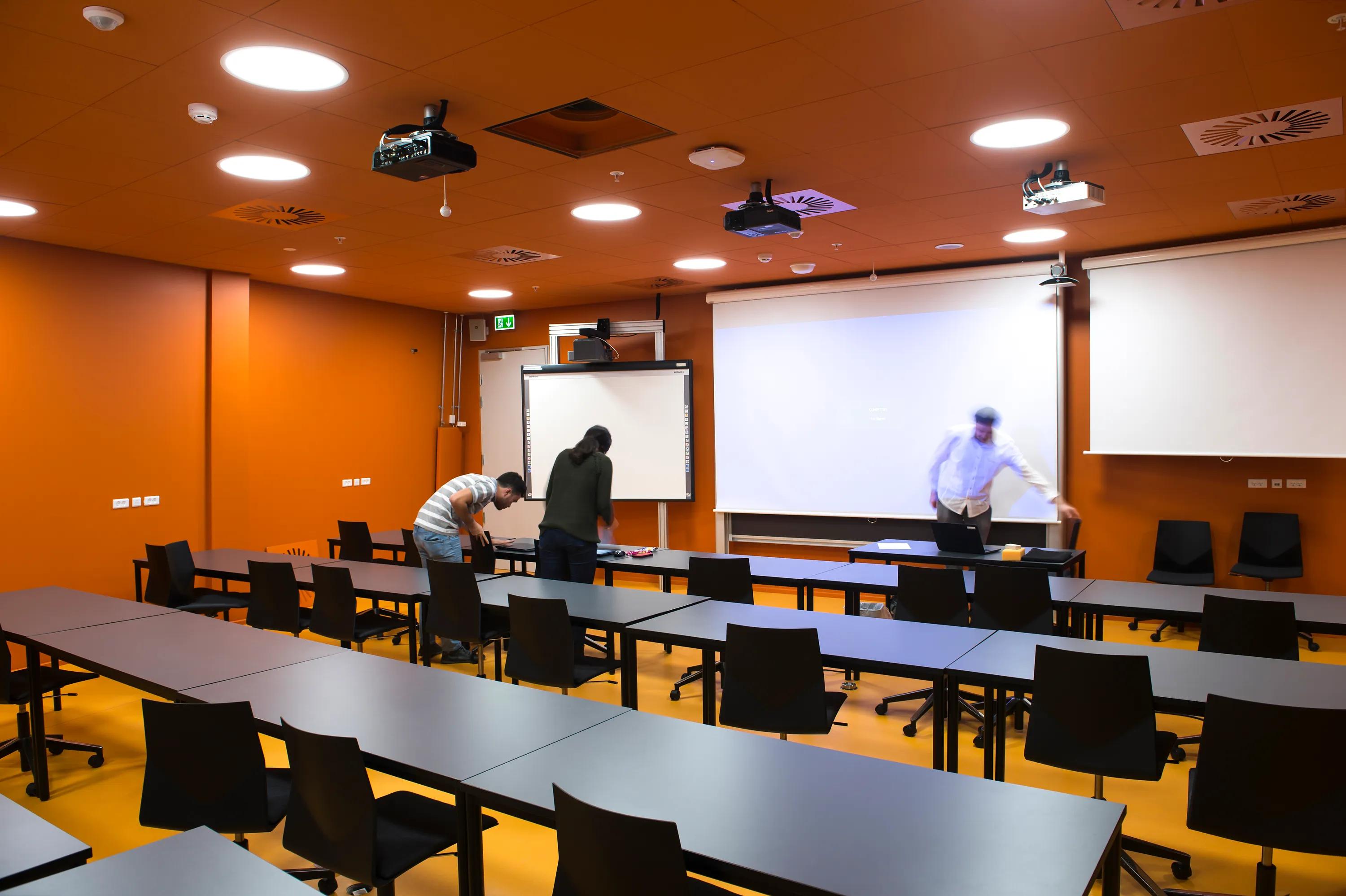 indoor school gymnasium with white ceiling tiles