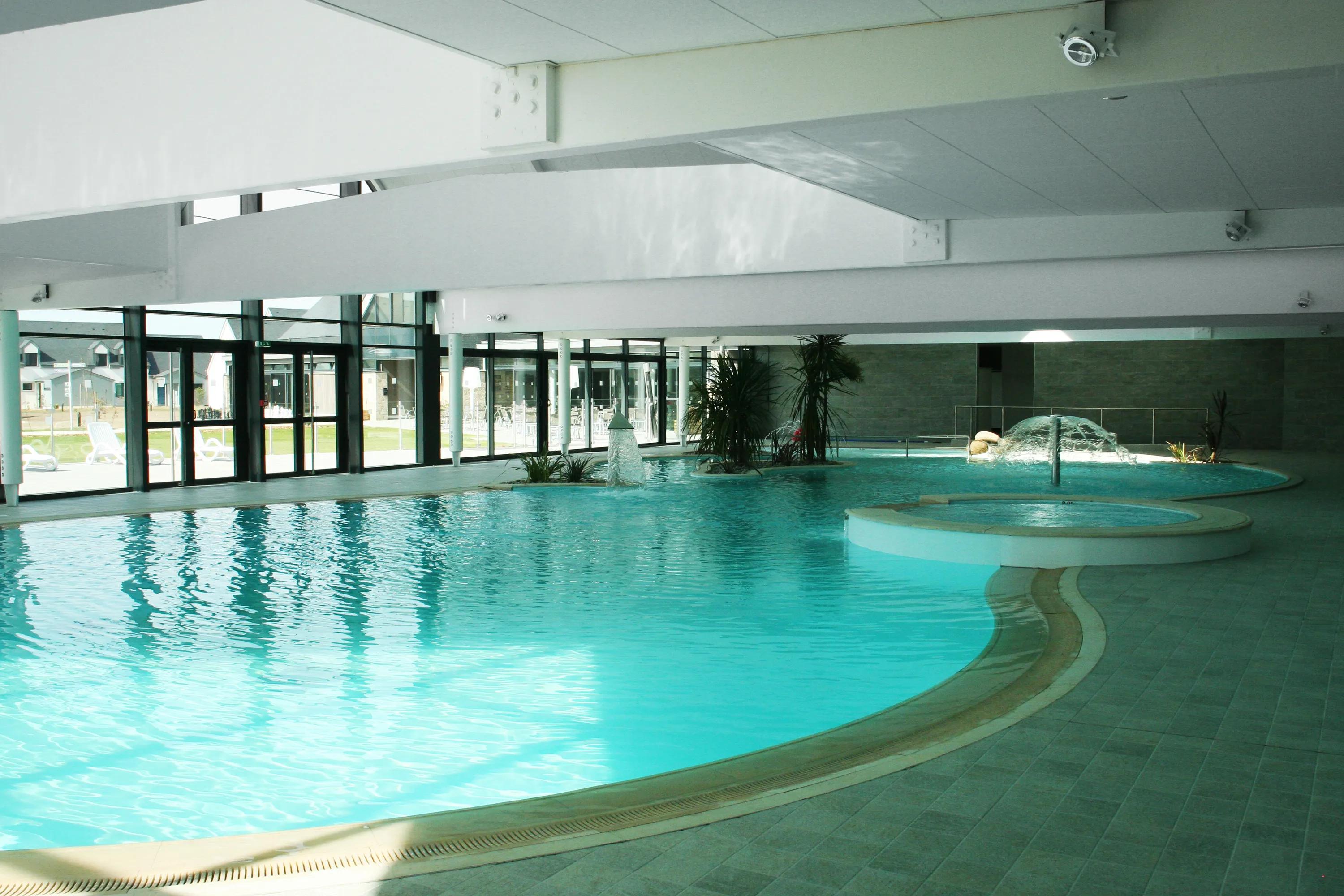 Swimming pool ceiling with white ceiling tiles