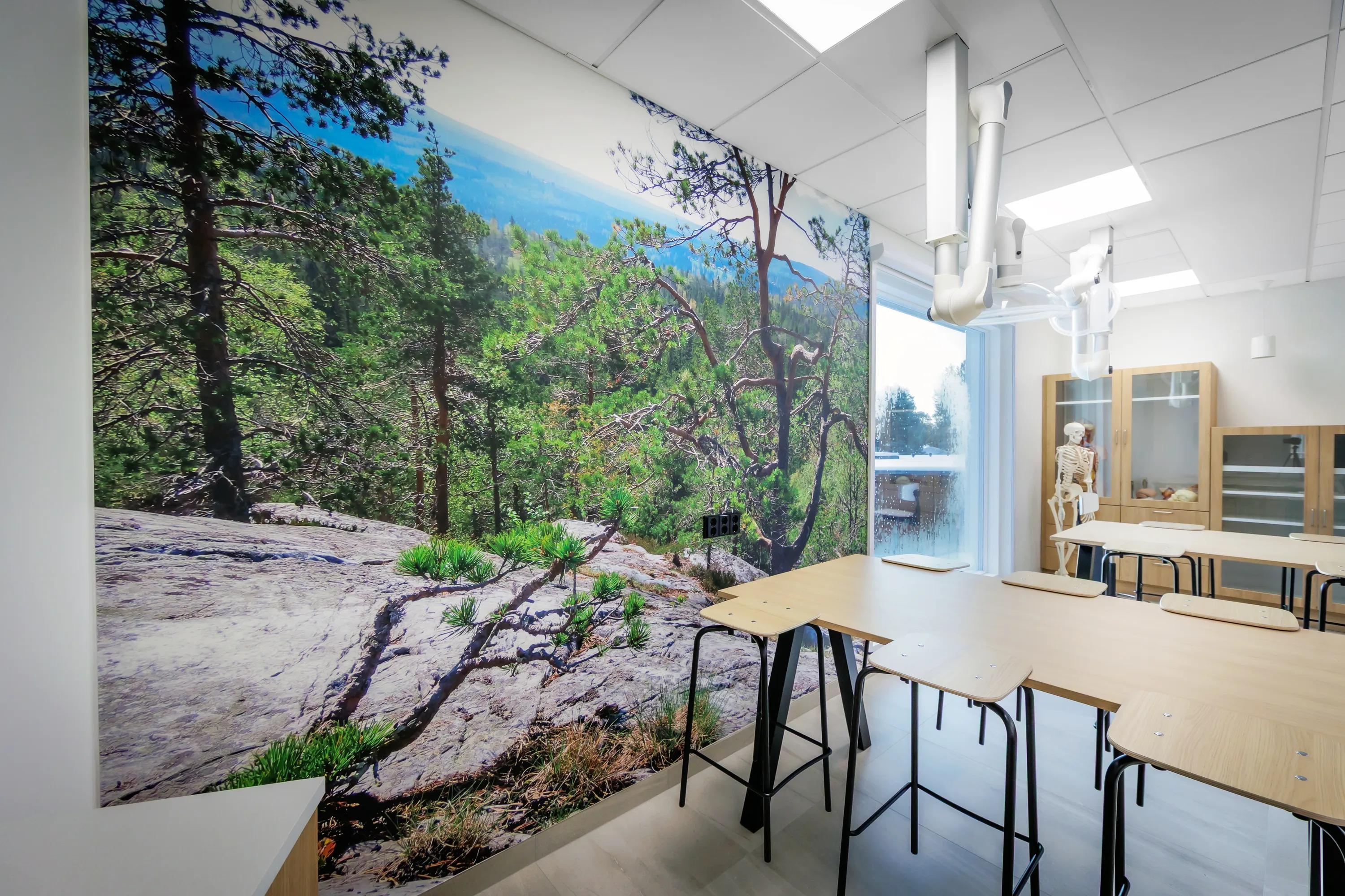 A classroom in Sotkamon lukio in Sotkamo Finland with Rockfon Cleanspace Pro fire-rated suspended ceiling tiles.
