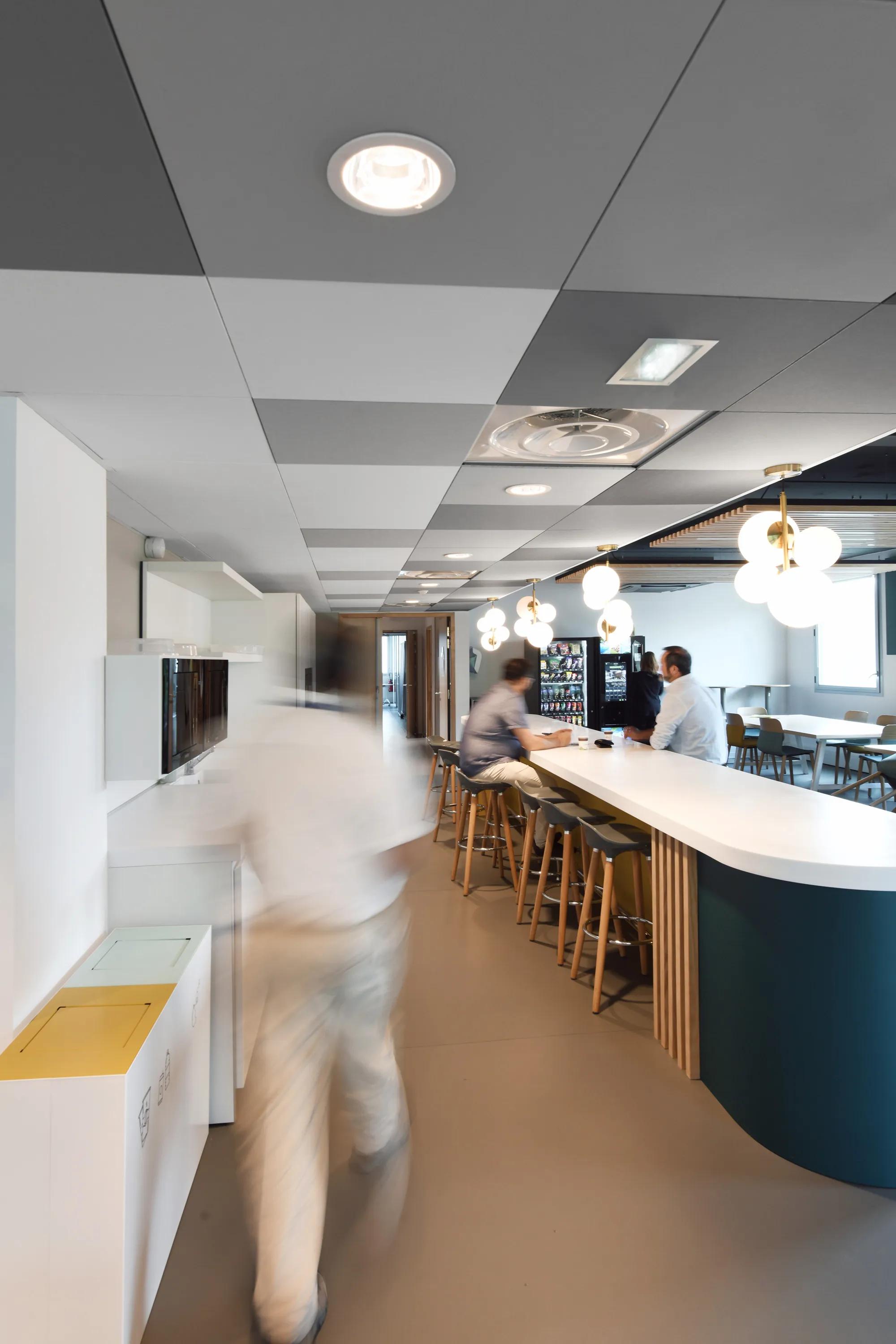Restaurant with grey checkered ceiling design