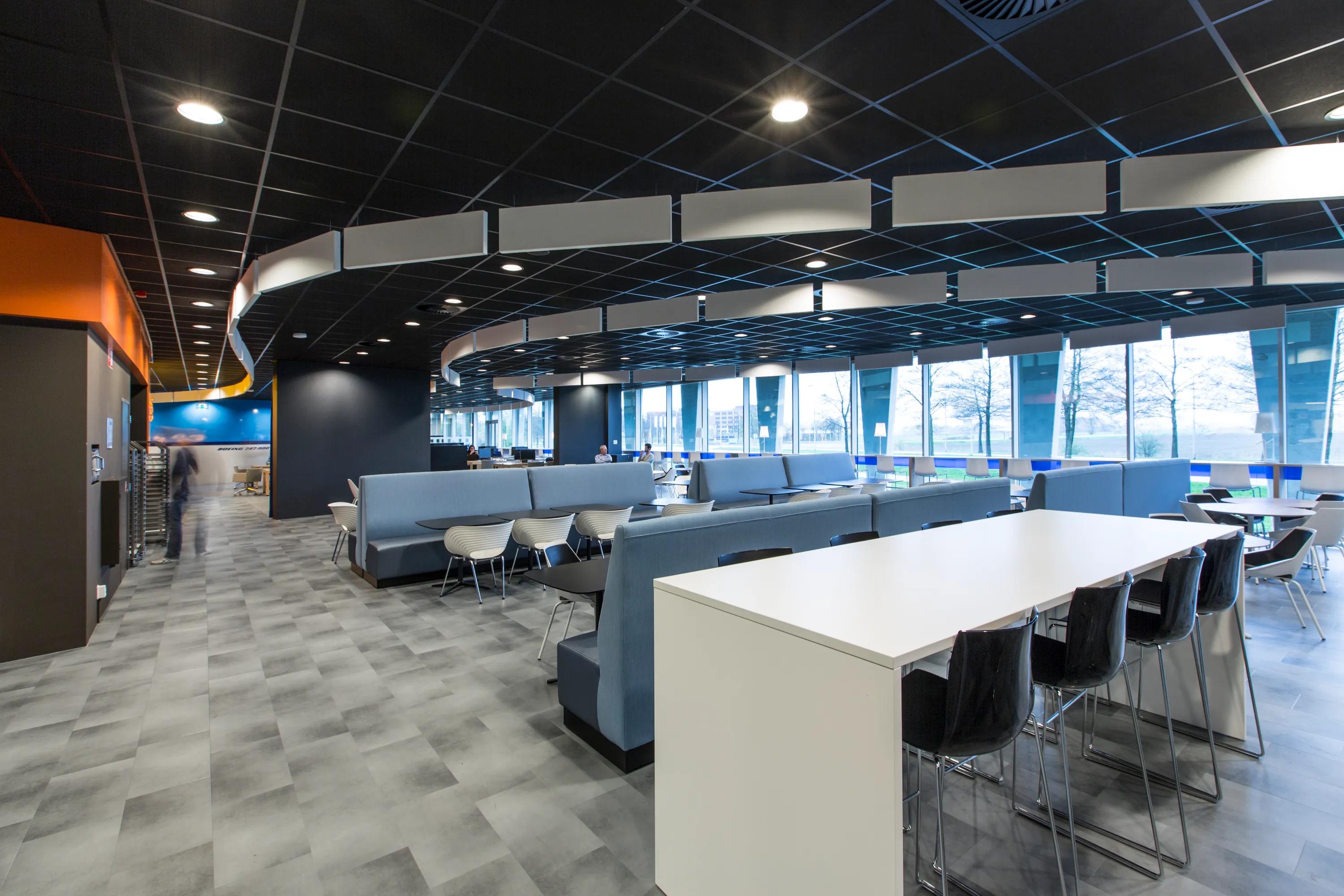 Interior design of Air France & KLM Lounge, Schiphol Airport with a Rockon Contour baffle ceiling