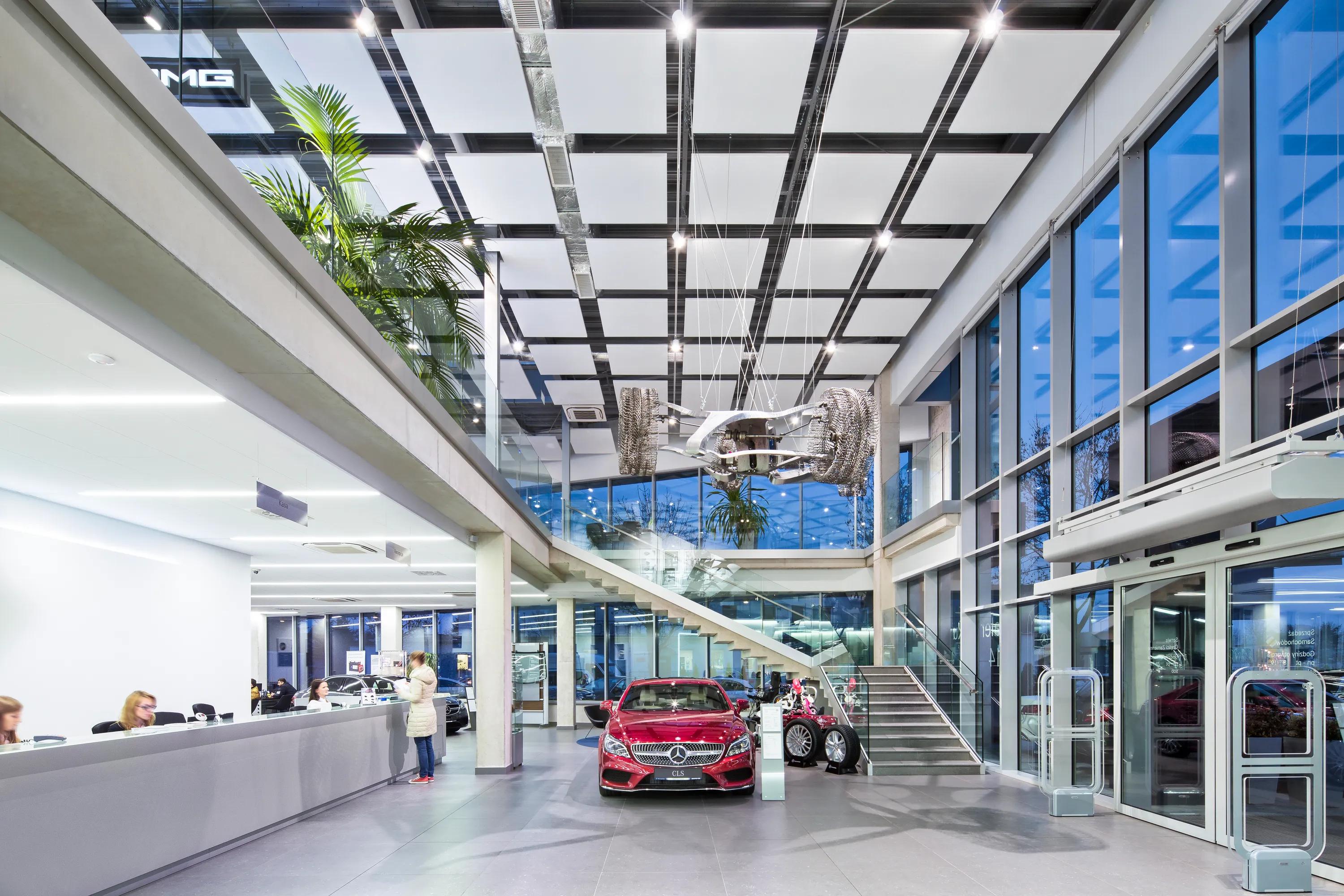 Detail view of Rockfon acoustic floating ceiling panels and suspending ceiling clouds or islands.