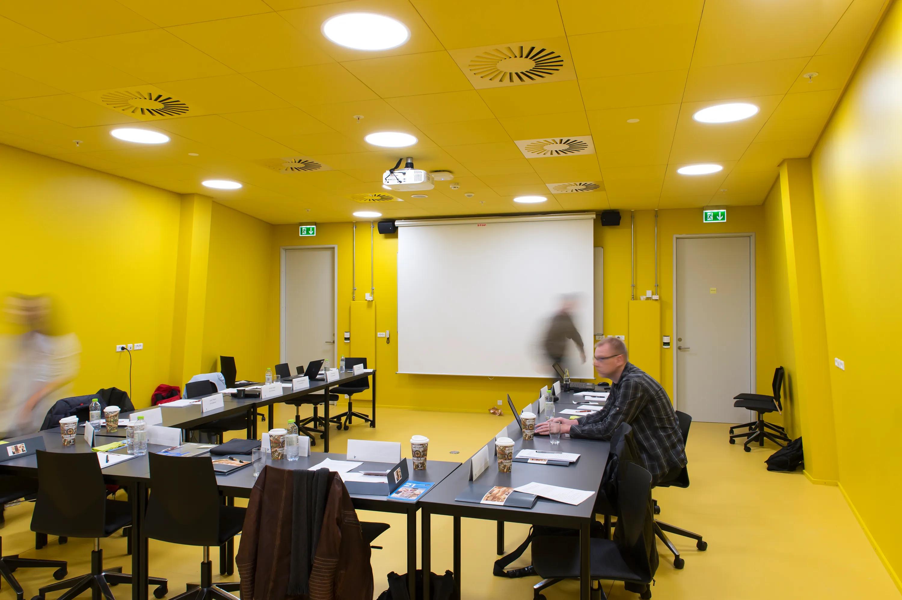Yellow classroom acoustic ceiling design