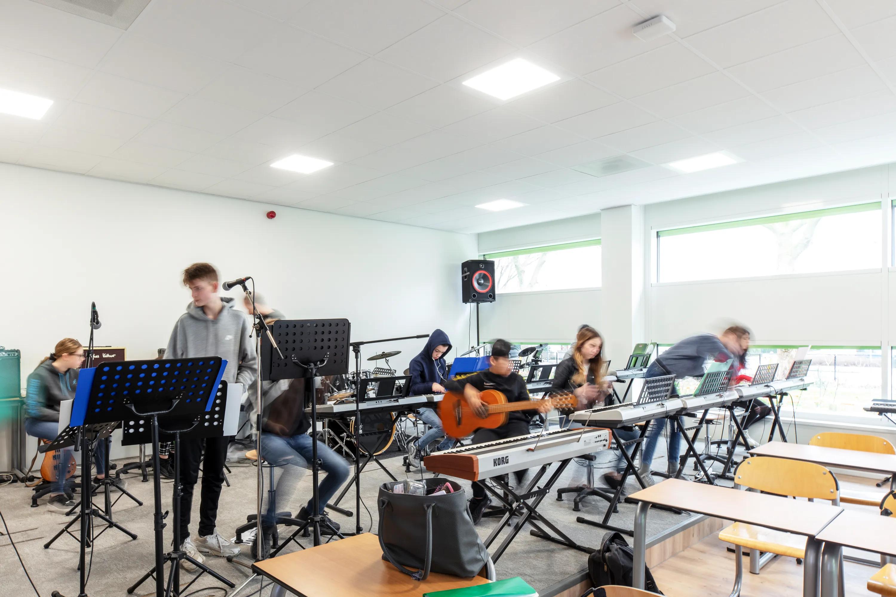 music classroom with white acoustic ceiling tiles