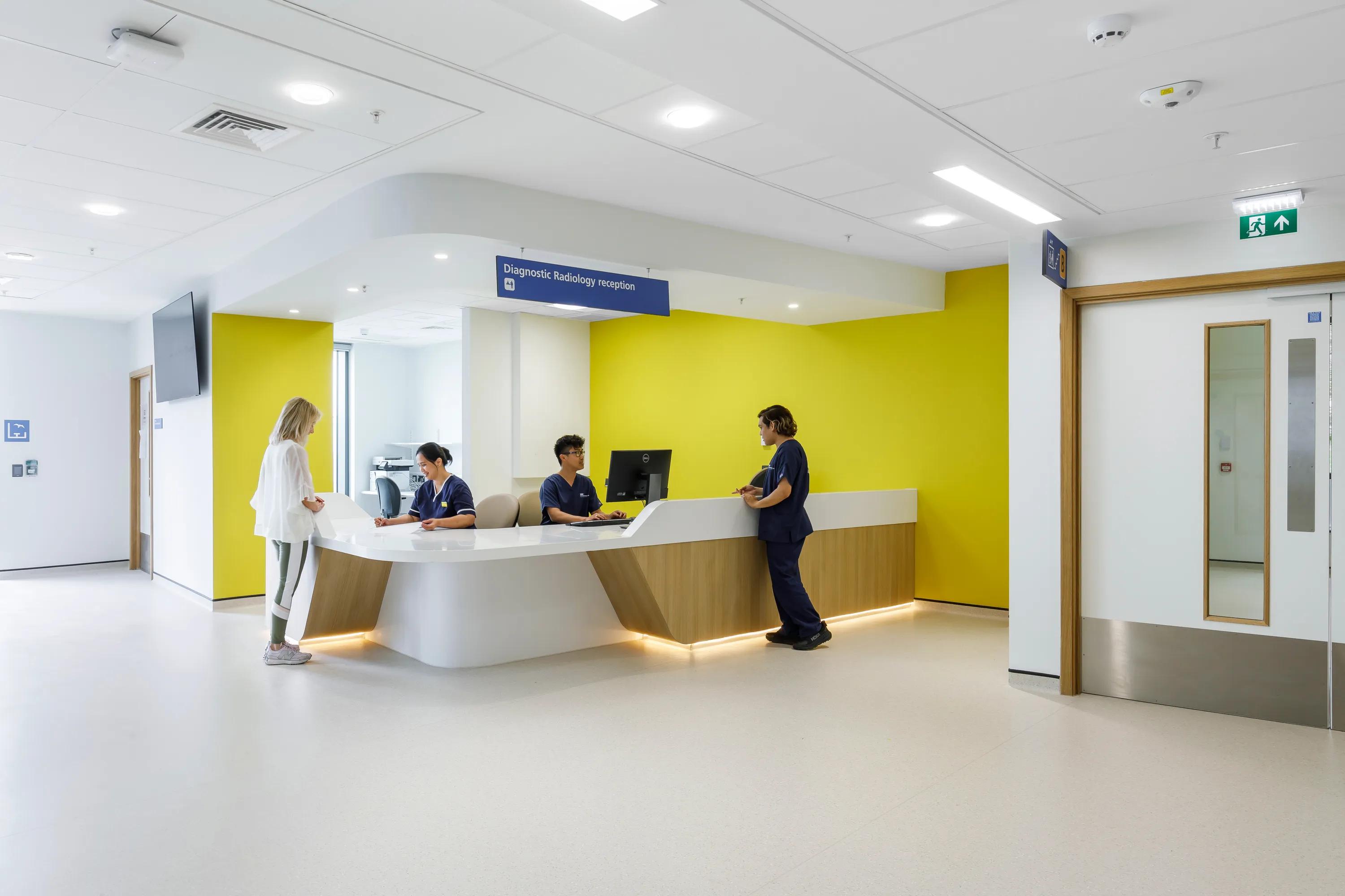 Reception in Royal Sussex Hospital in Brighton United Kingdom with Rockfon MediCare Standard A-Edge and Rockfon MediCare Plus A-Edge.