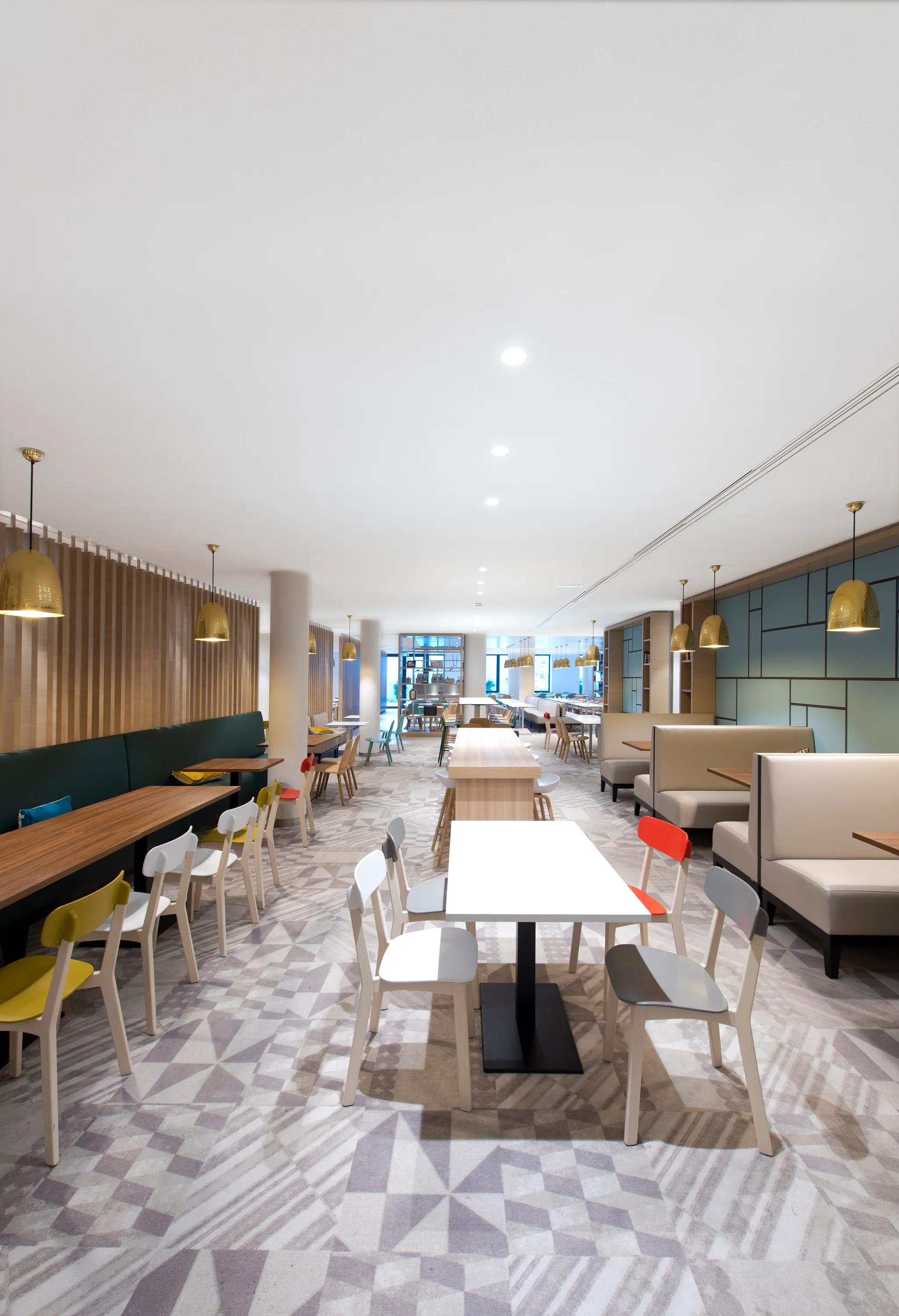 A food court dining area with acoustic solutions.